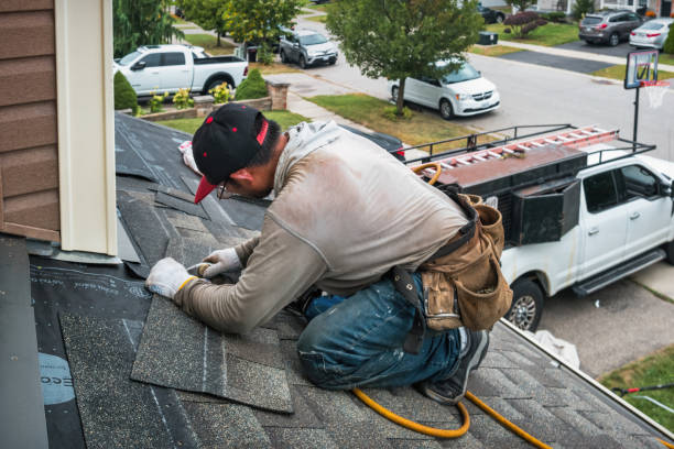 Professional Gutter Installation technician working in Hudson, MA